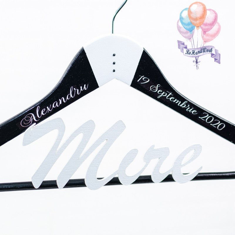 Personalized hangers for the bride and groom with pastel roses